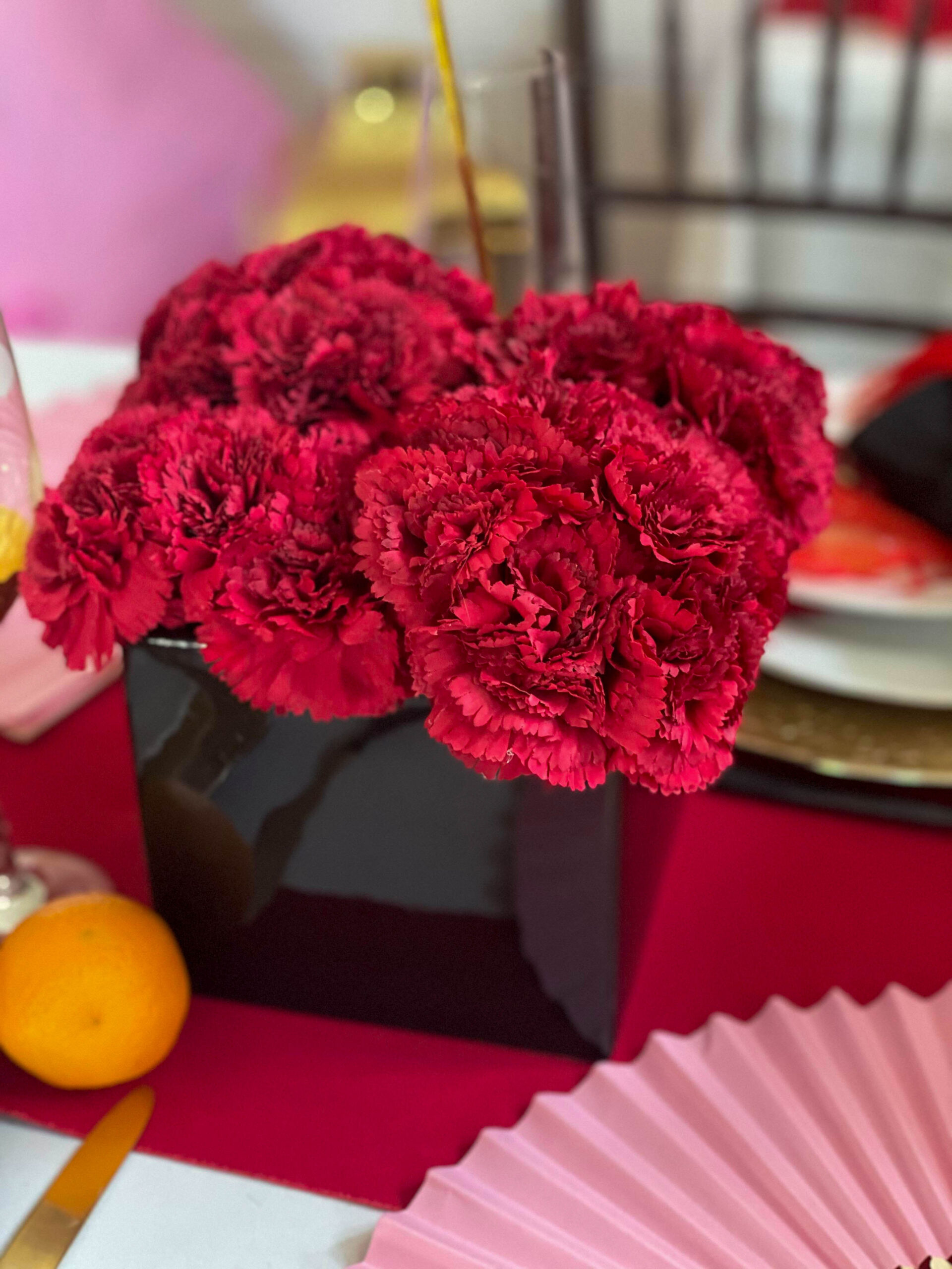 red carnation centerpiece for Chinese New Year