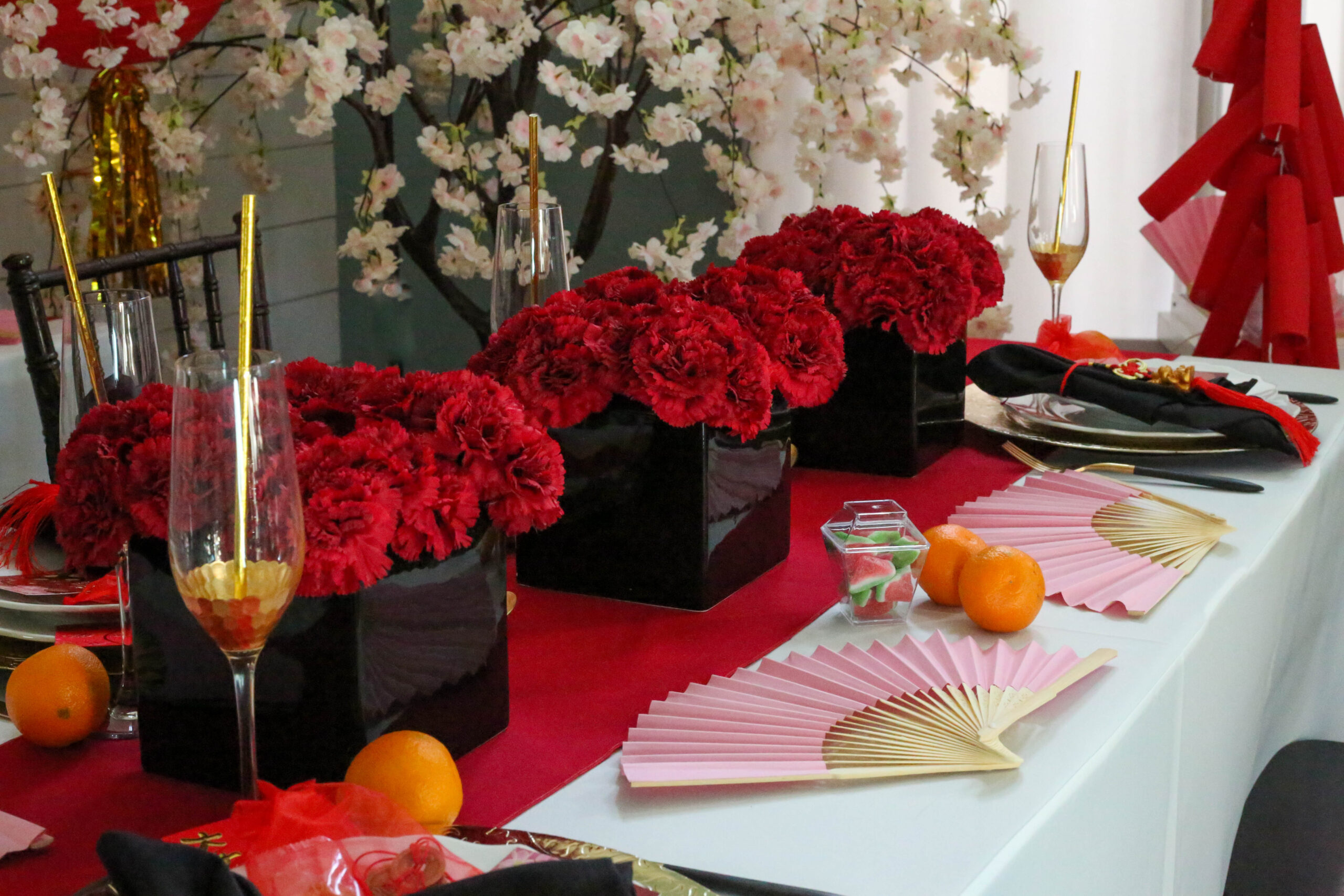red carnation centerpiece vases
