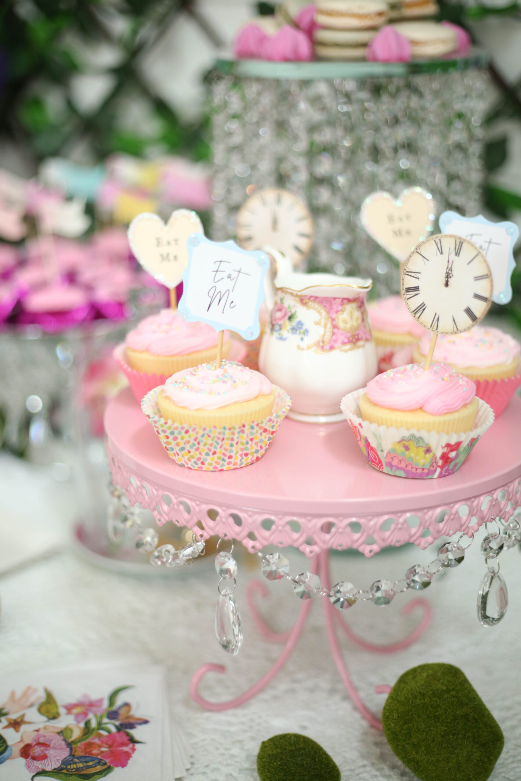 Easter cupcakes on a pink cake stand with crystals