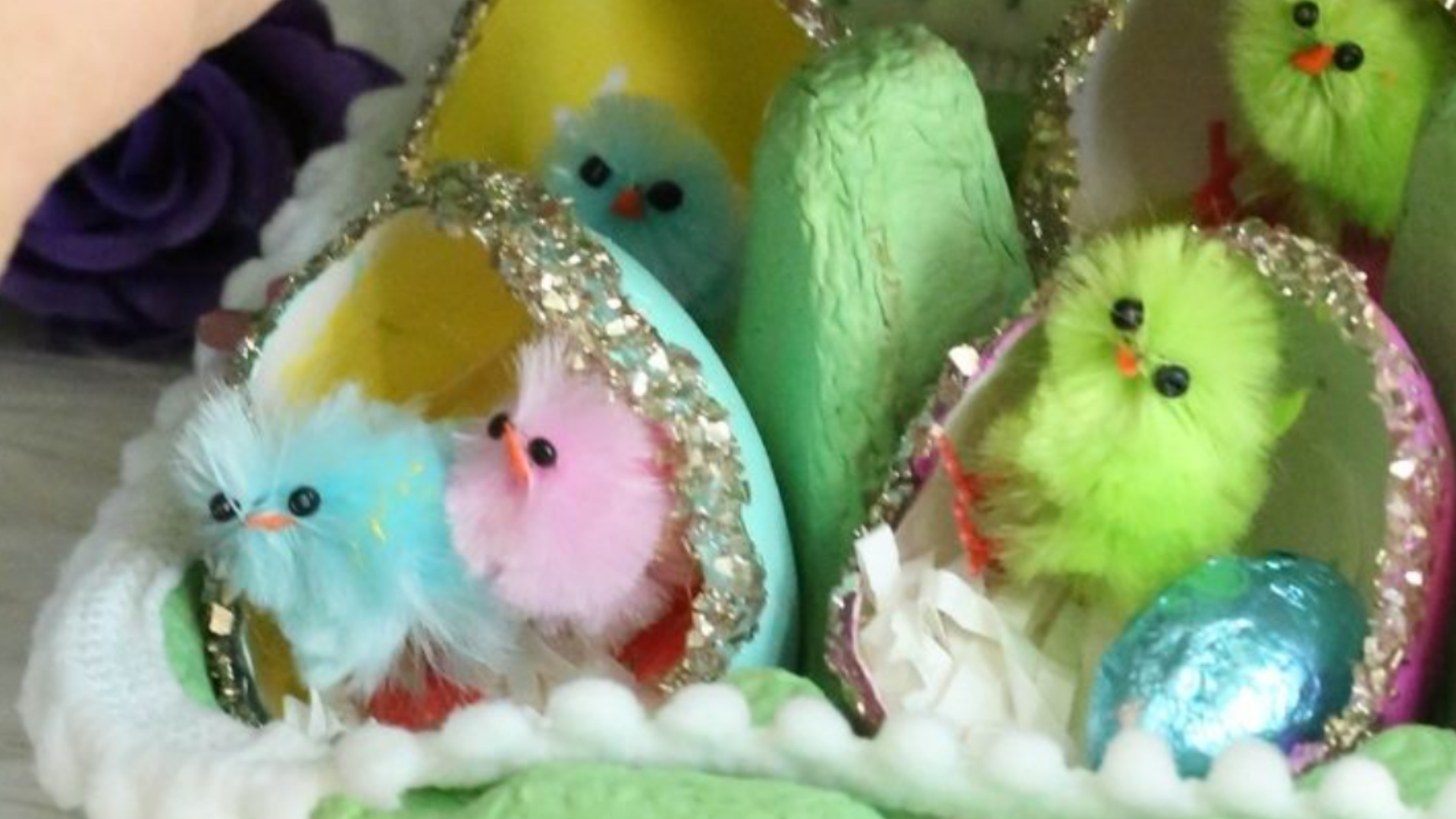 easter eggs painted with chicksPainted and glittered Easter eggs with colorful chenille chicks